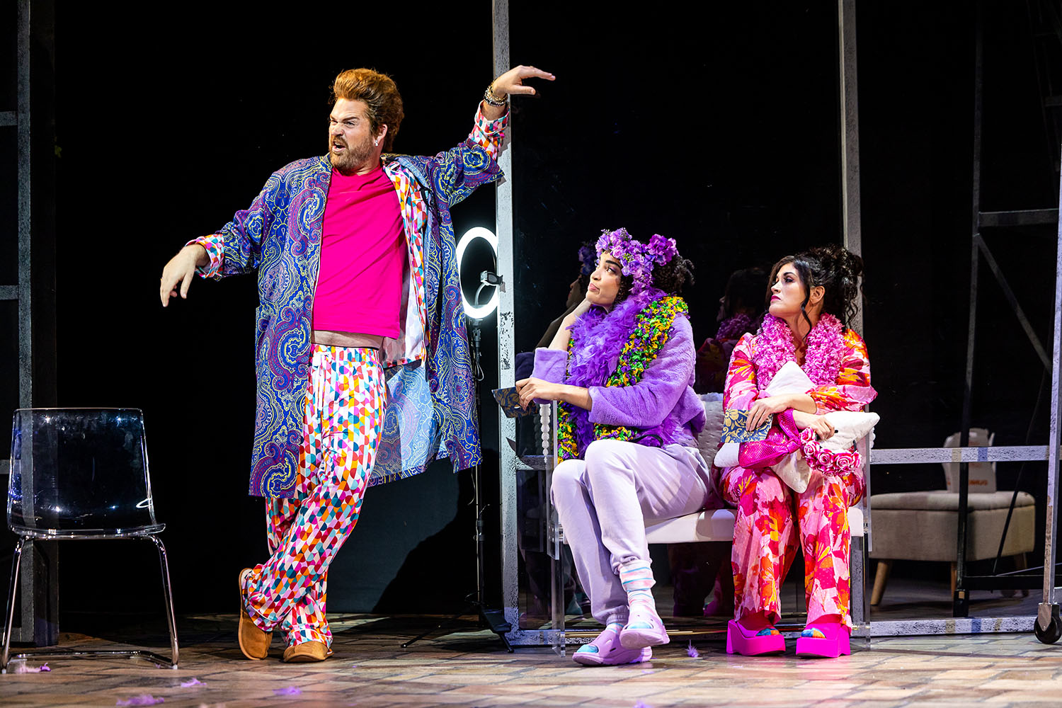 02-Don-Magnifico-Brandon-Cedel-l.-is-the-wicked-stepfather-to-Tisbe-Alexis-Peart-c.-and-Dana-Lynne-Varga-in-Boston-Lyric-Operas-production-of-La-Cenerentola-Cinderella.jpg