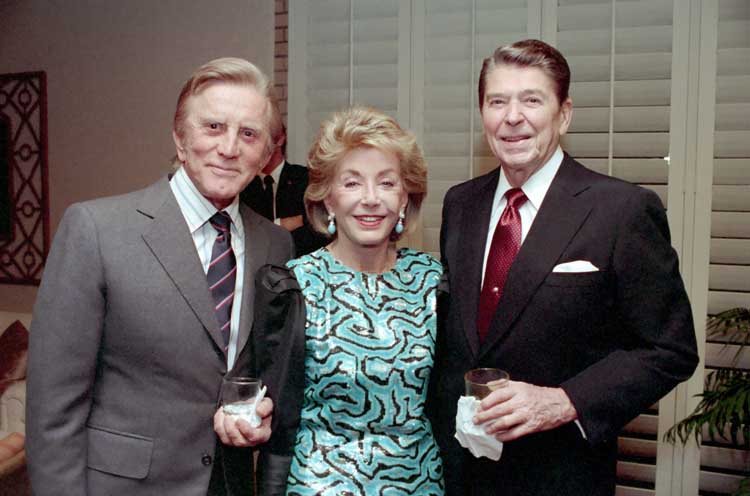 Douglas_and_wife_Anne_with_President_Ronald_Reagan_December_1987.jpg