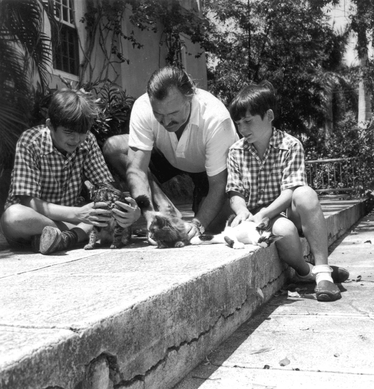 Ernest_Hemingway_with_sons_Patrick_and_Gregory_with_kittens_in_Finca_Vigia_Cuba.jpg
