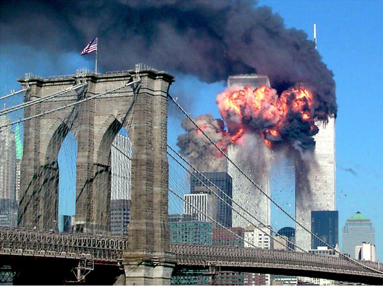 The_second_tower_of_the_World_Trade_Center_bursts_into_flames_after_being_hit_by_a_hijacked_airplane_September_11_2001._REUTERS_Sara_K._Schwittek.jpg
