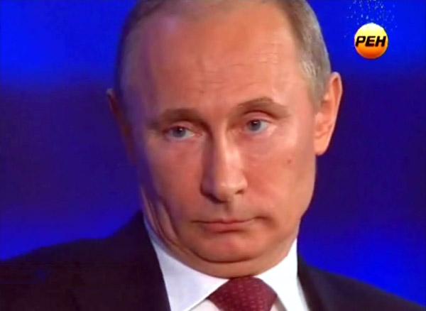 Во время Большой пресс-конференции В.Путина 20 декабря ему было задано много неудобных для него вопросов... На снимке: Путин реагирует на вопрос о антимагнитском законе, рассматриваемом в Думе. Photo Courtesy: РЕН ТВ / Seagull Publications 