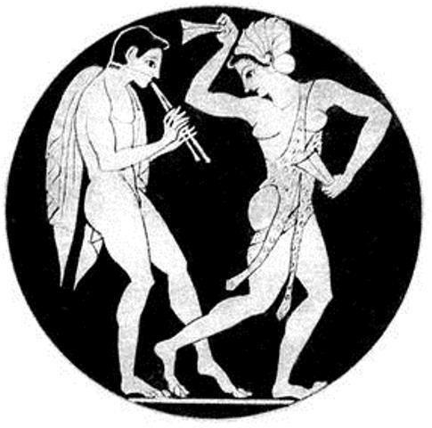 Музыкант, играющий на двойной флейте.  Роспись на древнегреческой вазе (V век до н. э.)