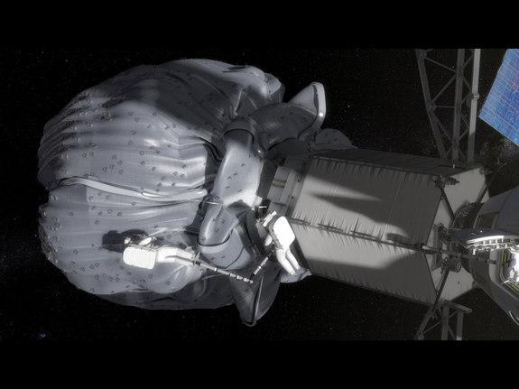 Стыковка корабля-робота с мешком, в котором отловленный астероид (слева), и пилотируемого двумя астронавтами корабля «Орион»(справа). Астронавты, работая в открытом космосе, набирают в контейнеры образцы астероида. Кадр из анимационного фильма NASA. 