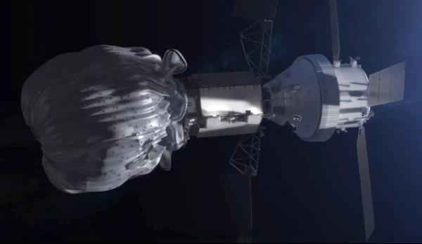 Корабль-робот с мешком с астероидом (слева) и пилотируемый двумя астронавтами корабль «Орион» (справа). Кадр анимационного фильма НАСА. Courtesy: NASA / Seagull Publ.